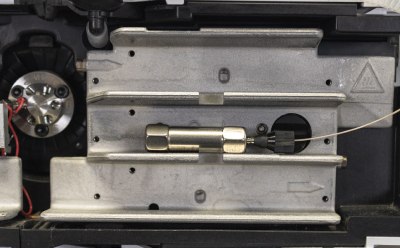 Stand-alone guard cartridge connected to inlet tubing. A second piece of tubing with a connecting nut is required to connect to the analytical column. Stand-alone guard cartridge connected to inlet tubing. A second piece of tubing with a connecting nut is required to connect to the analytical column.