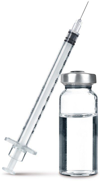 Liquid Formulation Strategies: a clear syringe with black measurement markings and a needle, positioned diagonally above a small glass vial containing a clear liquid.