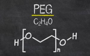 Polyethylene glycol chemical structure written as chemical formula C2H4O on a chalk board.