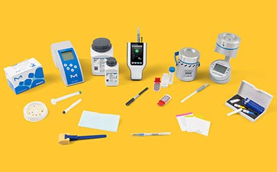 A comprehensive array of hygiene monitoring products for the food and beverage industry, featuring HY-LiTE and MVP Icon ATP Instruments, MAS-100 and MAS-ECO Air Monitoring systems, Flash Allergen Swab, eMcollect sterile sampling devices, Dips & Slides, MC-Media Pad, and pathogen detection kits, all arranged on a white background. 
