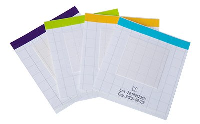 A set of four rapid-testing strips with color-coded headers, each representing a different test for quickly identifying indicator organisms, complete with batch number and expiration date for quality assurance.