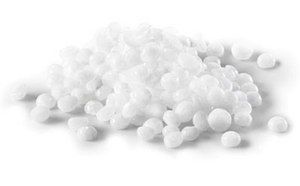 The image displays a pile of white polystyrene foam balls of various sizes on a uniform white background.