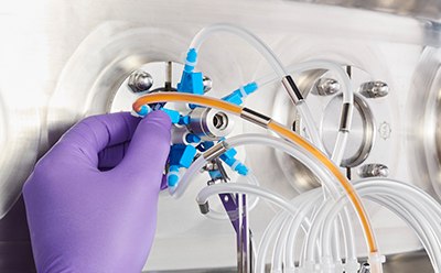 Press down the trigger to establish a sterile fluid path and start your aseptic sampling 