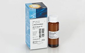 A brown bottle, filled with β-Glucuronidase and sulfatase enzymes, and its packaging. The packaging is predominantly white with blue design elements. It includes text, a barcode, and a circular yellow logo at the top.