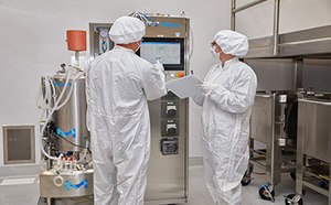 Millipore CTDMO Viral Vector Manufacturing Facility scientists in a manufacturing facility