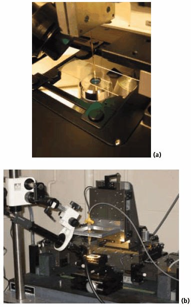 Photographs of 3-axis, motion-controlled stages utilized in direct-write assembly